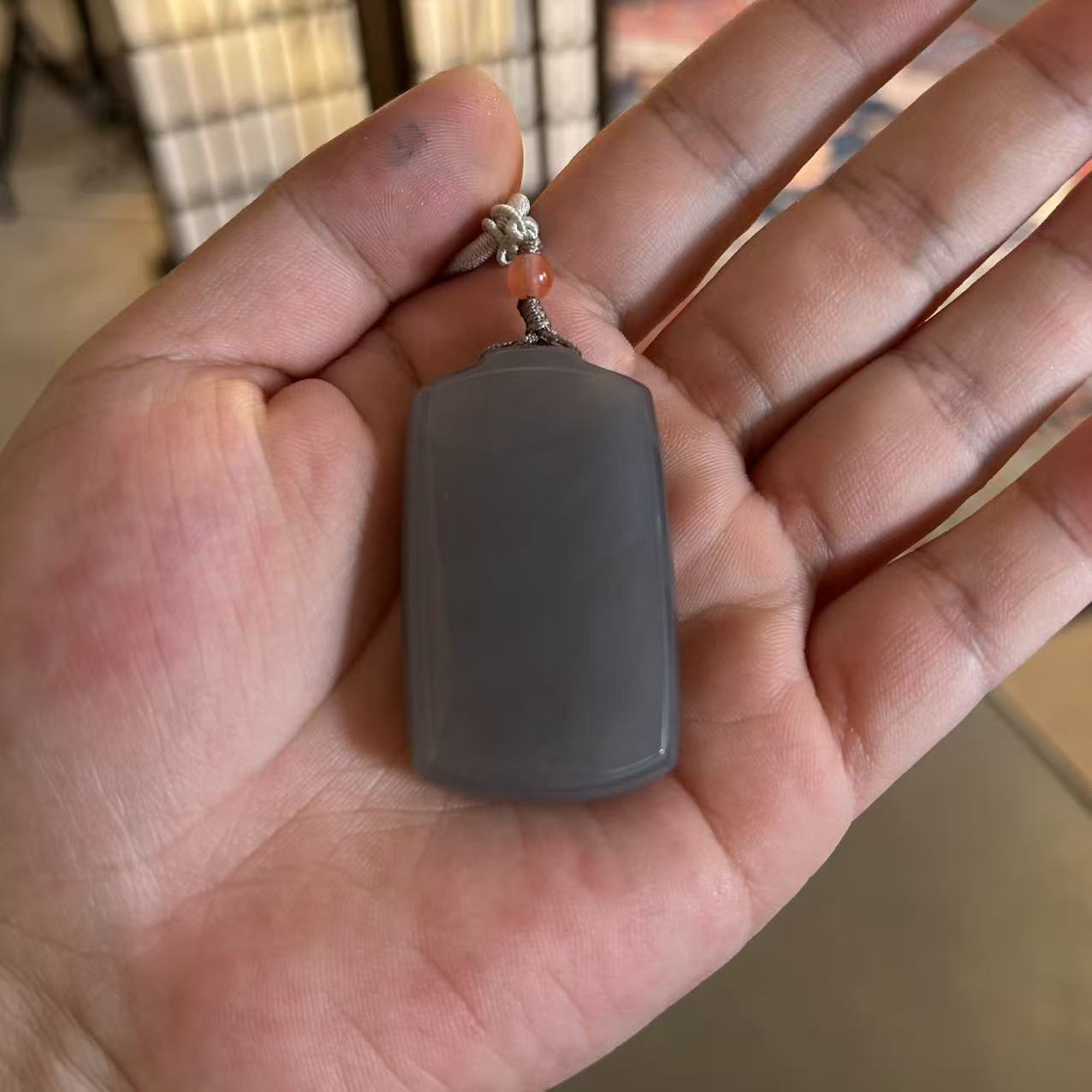 【上新了故宫】和田玉无事牌 烟紫