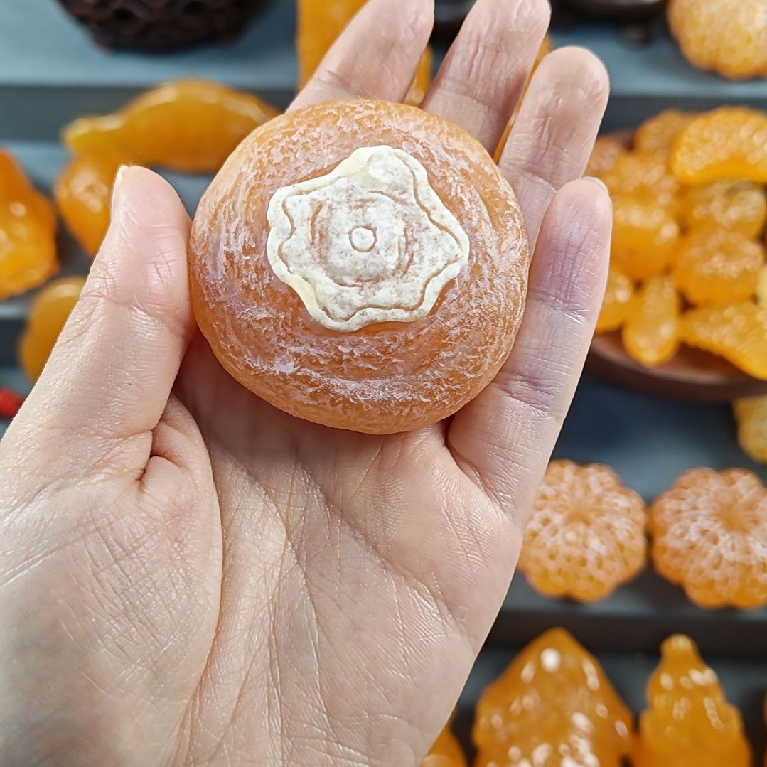 恋***莎石材金冻石手工雕刻柿饼摆件