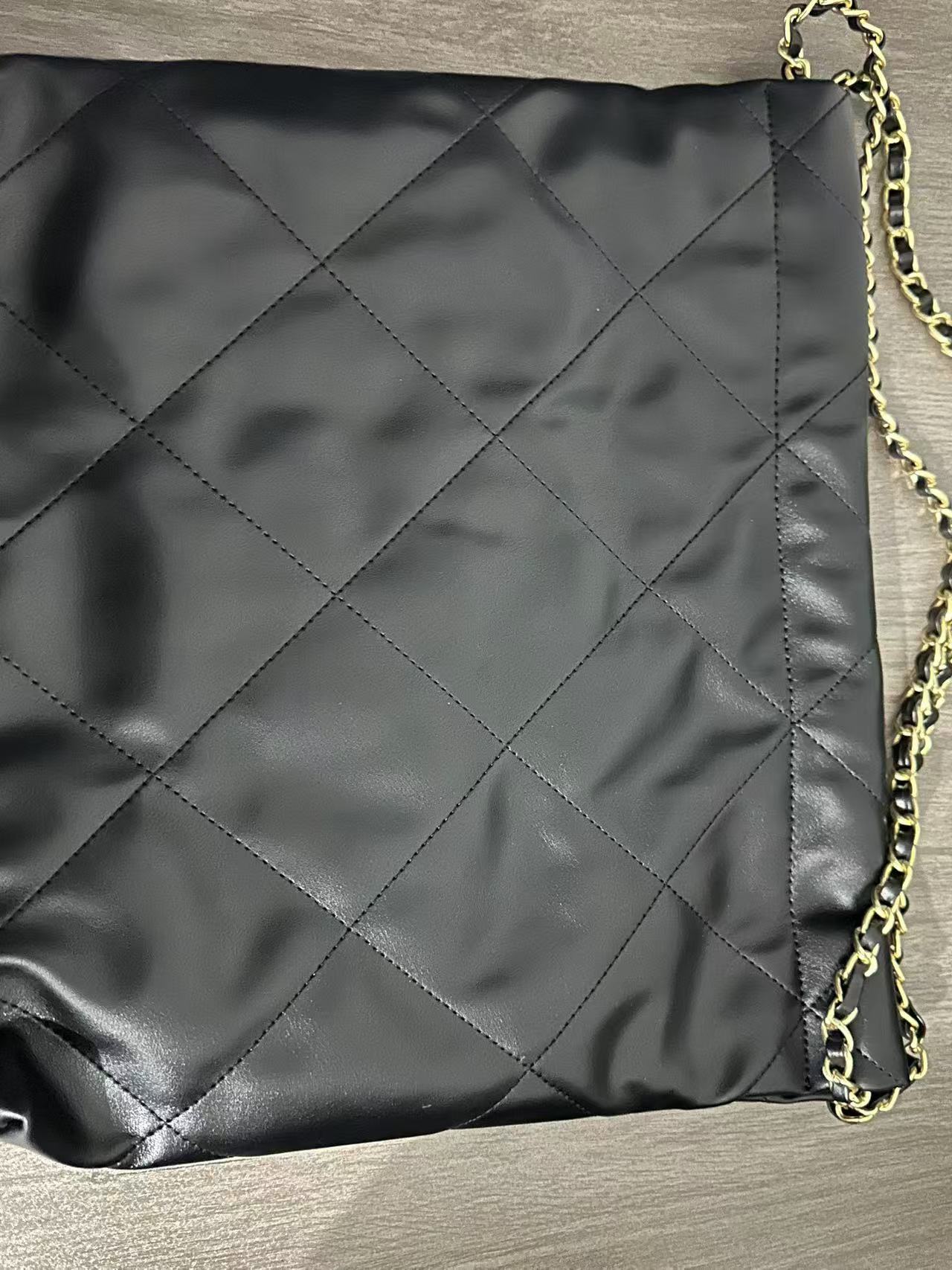 经典垃圾袋真皮女包