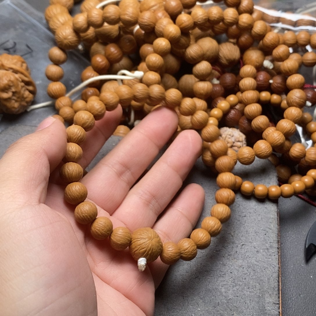 旭***猴头核桃吊坠凤羽