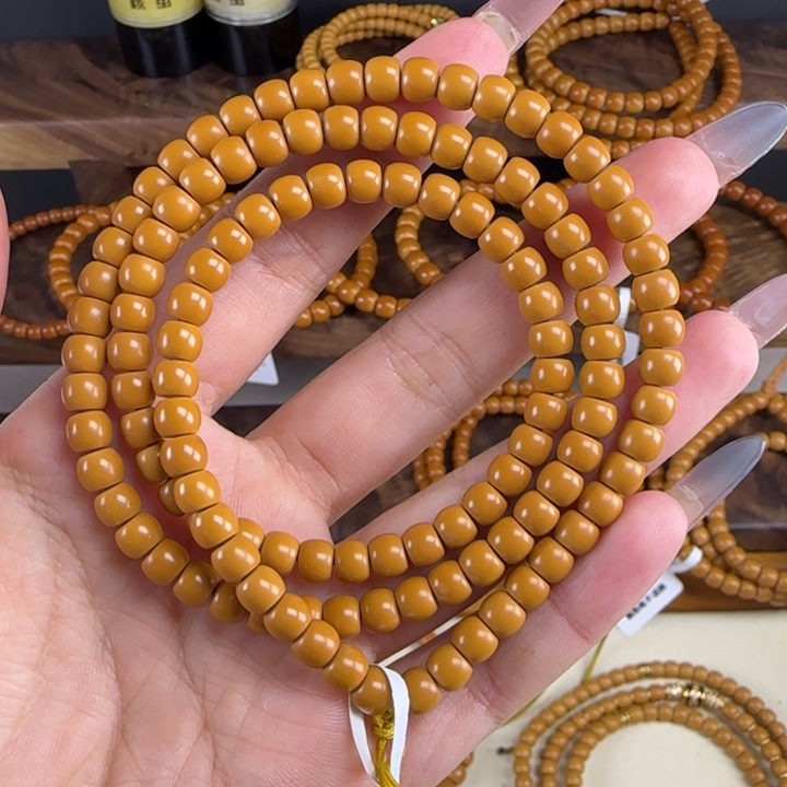 ****啦吊坠橄榄核6.0mm 老挝核长串核尖全品