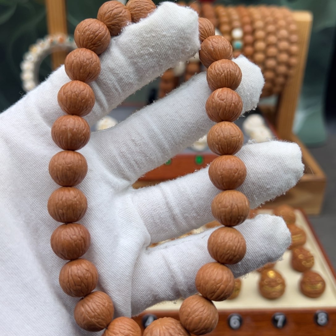 江***氚吊坠猴头核桃凤羽