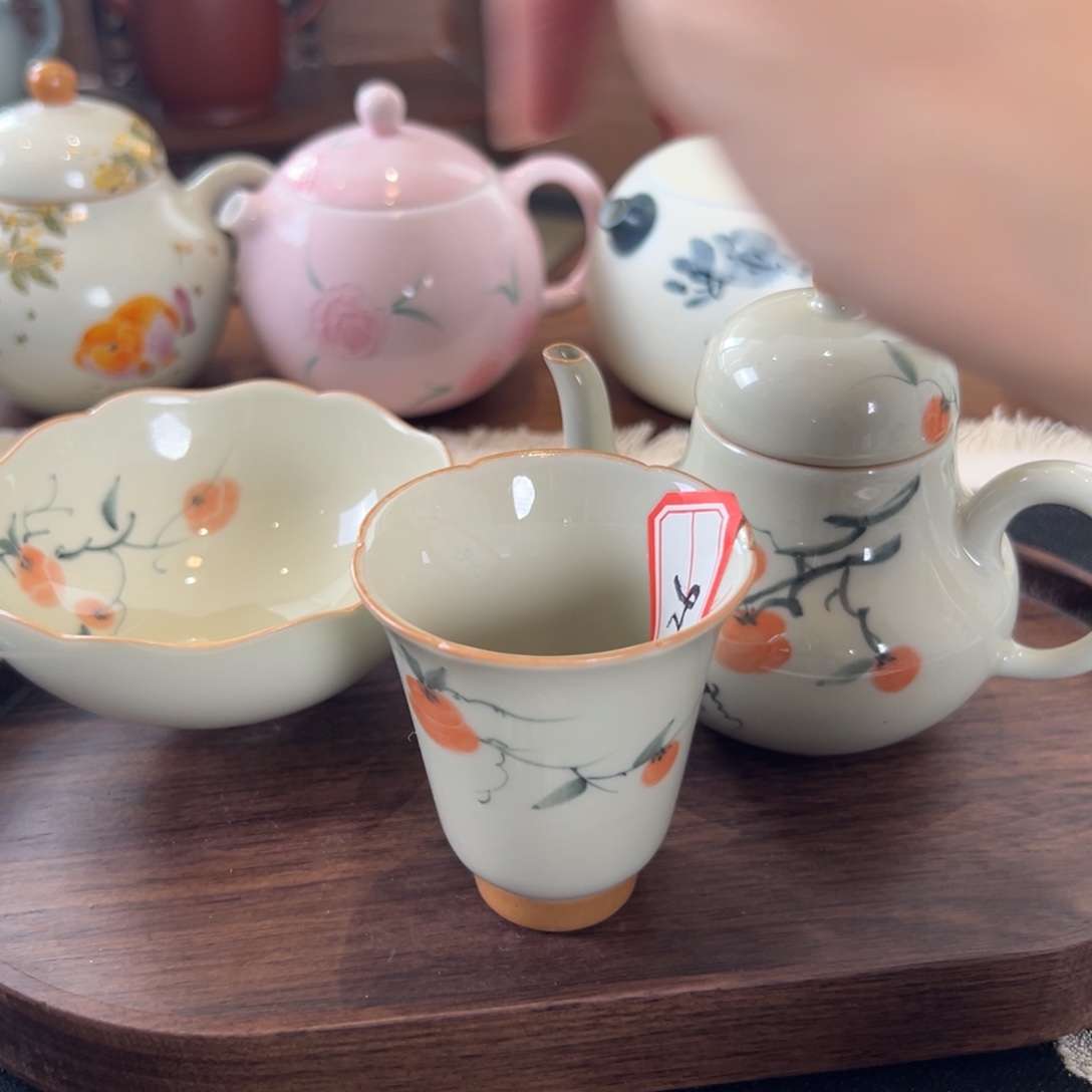 茶具等产品的生产和销售为一体而