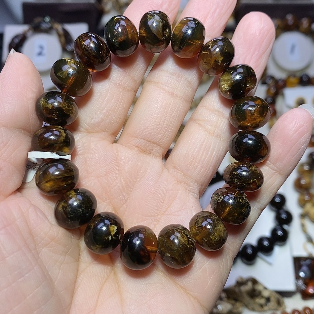 正***辉琥珀未镶嵌裸石蜡花13m