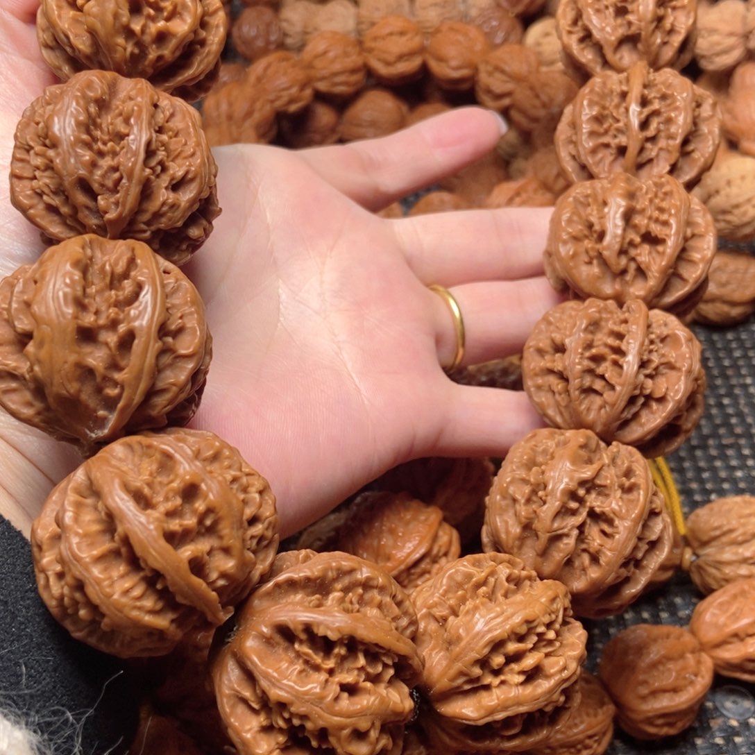 杨***红吊坠桃核霸王龙粗筋八棱