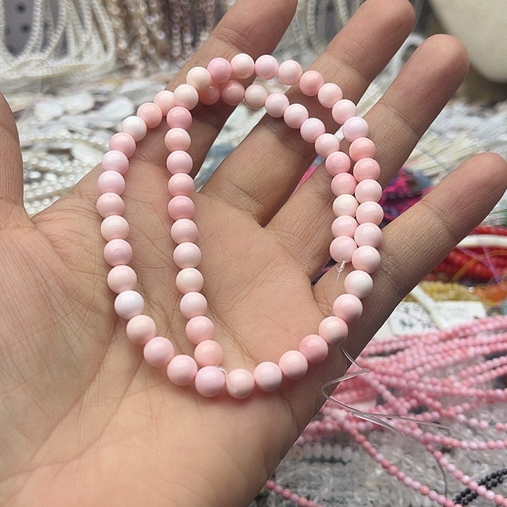 玛瑙/玉髓未镶嵌珠宝半成品一条6mm左右粉贝贝