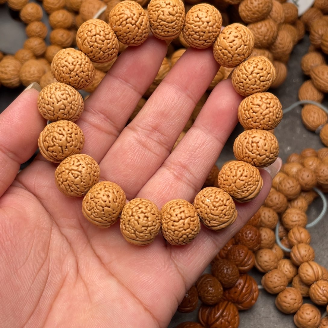 天***娥桃核手串蚂蚁肥脐闪40