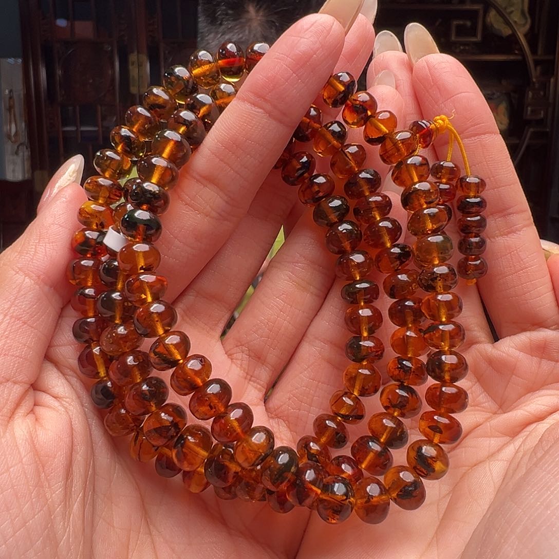 琥珀裸石未镶嵌抚顺琥珀20061。8mm