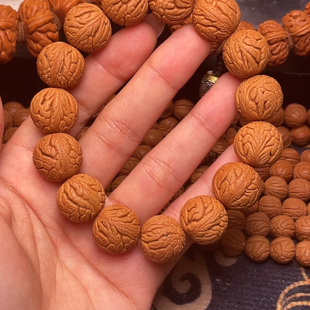 手串桃核金丝龙珠1.6+