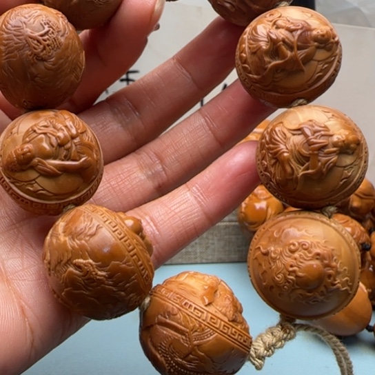 橄榄核手串语*湘雕刻工艺