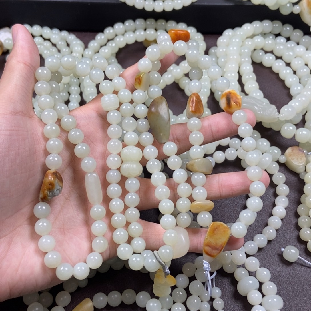 与***乐和田玉未镶嵌把件