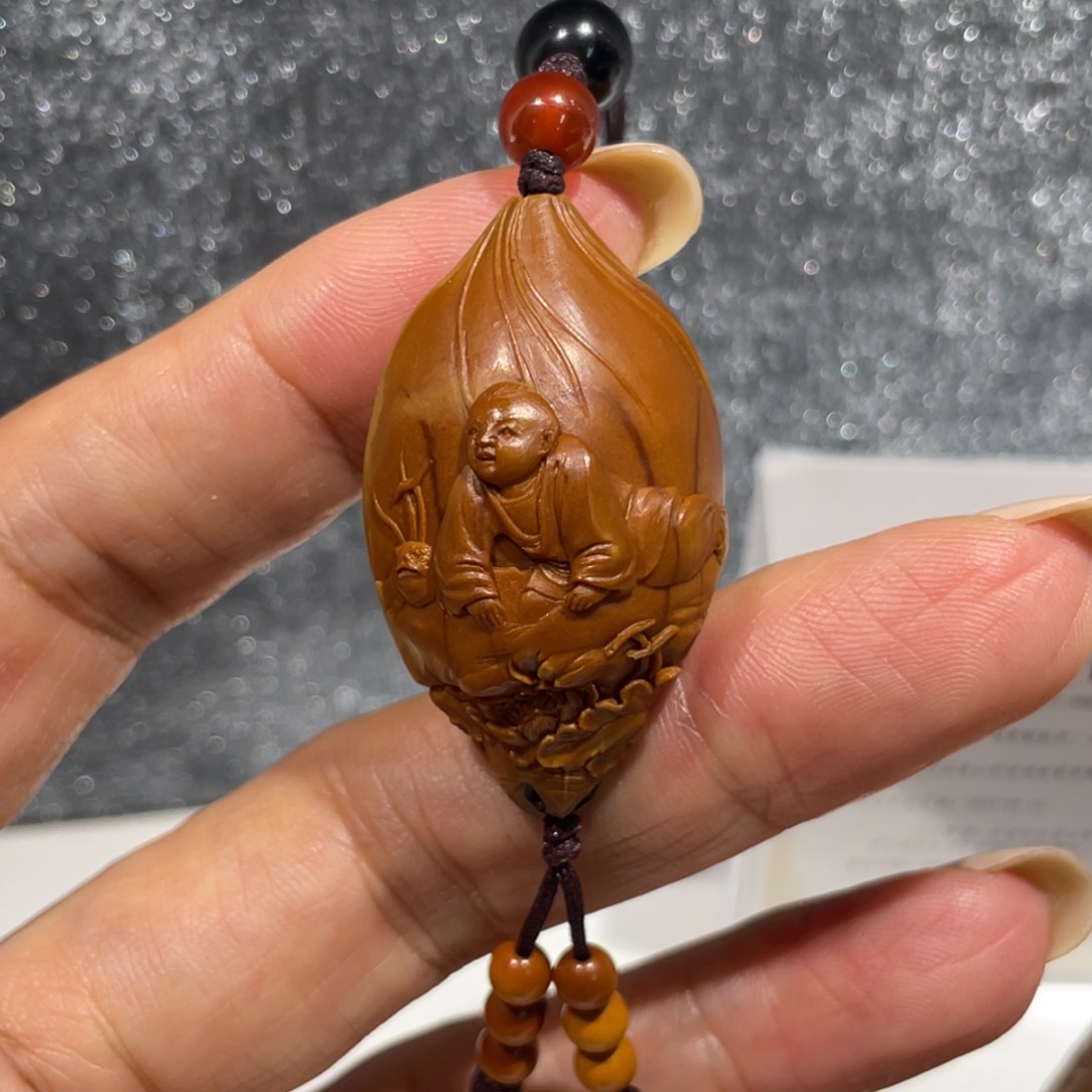 吊坠橄榄核童趣单子