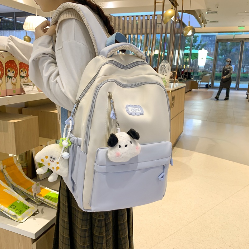 尼龙书包女日系ins高颜值甜美风中小学生三到六年级简约轻便双肩