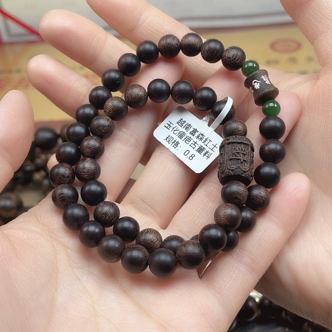 沉香手串{****度越南富森红土玉化瘤疤