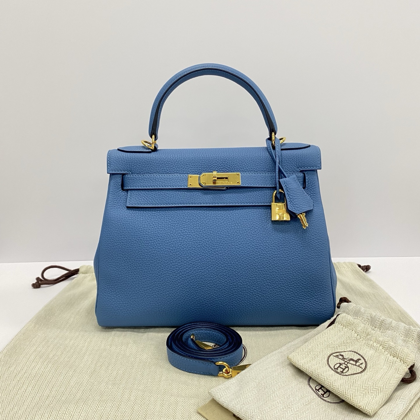 95新 Hermes/爱马仕 北方金扣kelly28手提单肩斜挎包 83385