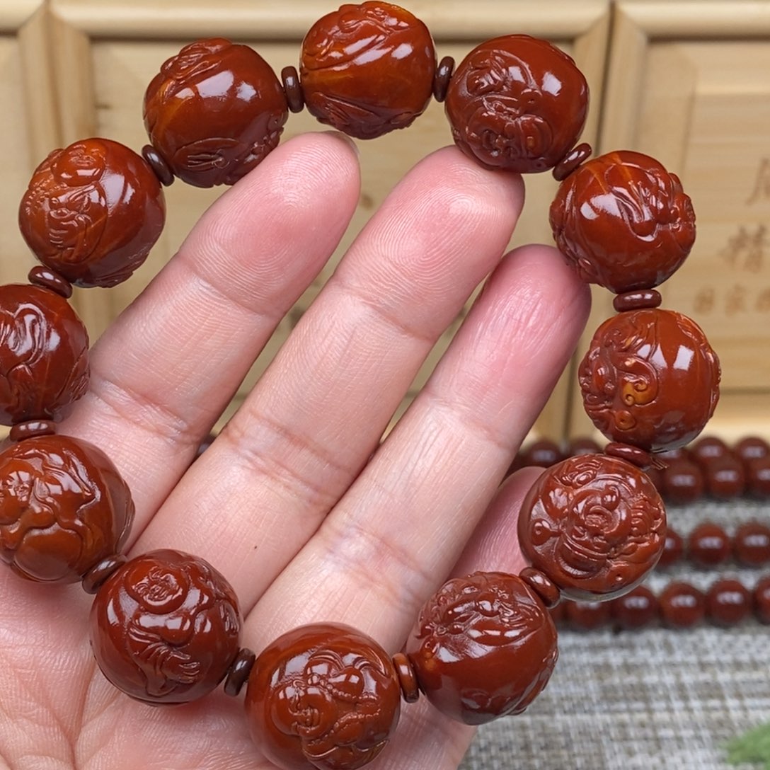 张***鸣吊坠橄榄核财迷18