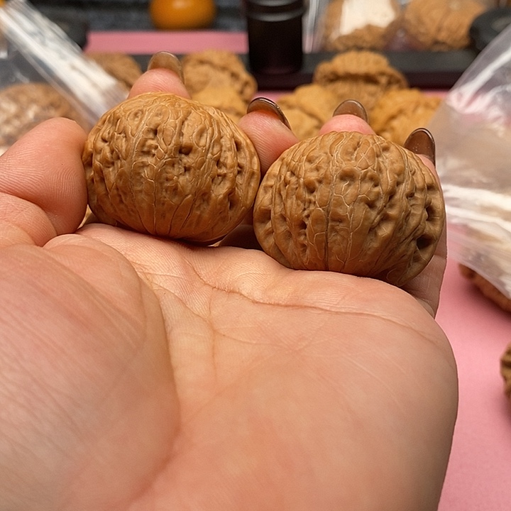 张***四把件文玩核桃铁锤有水尖