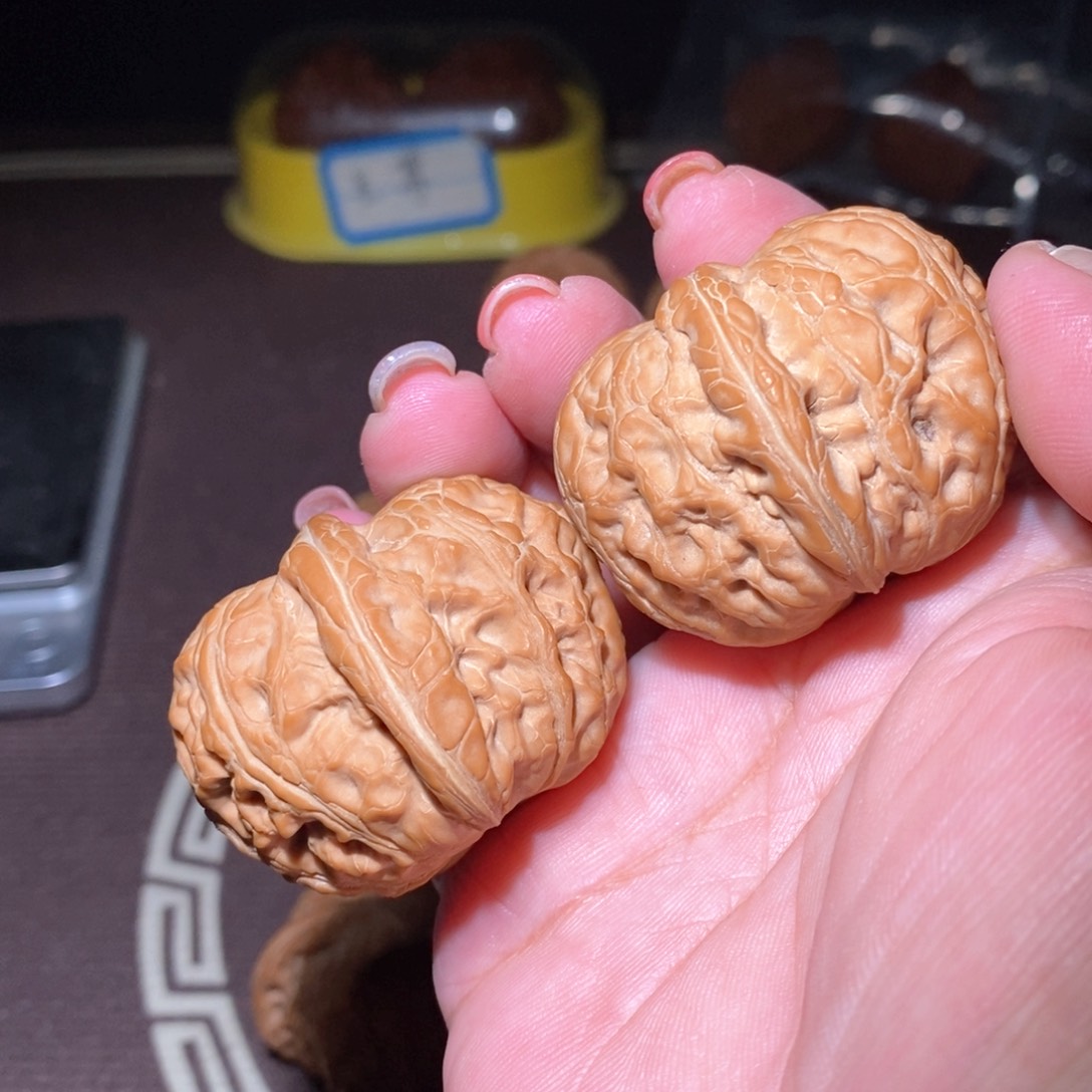 文玩核桃把件查****t元宝