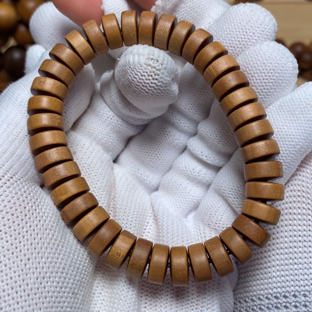 檀香木其他4*10 顺纹 药片珠 老山檀香