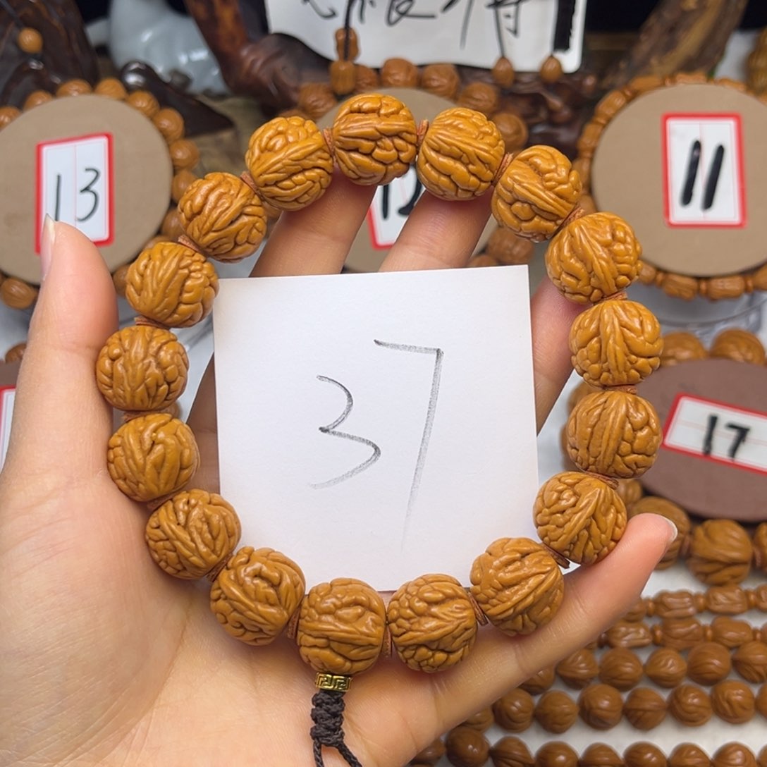 核桃龙纹桃核手持肚卡17霸王龙