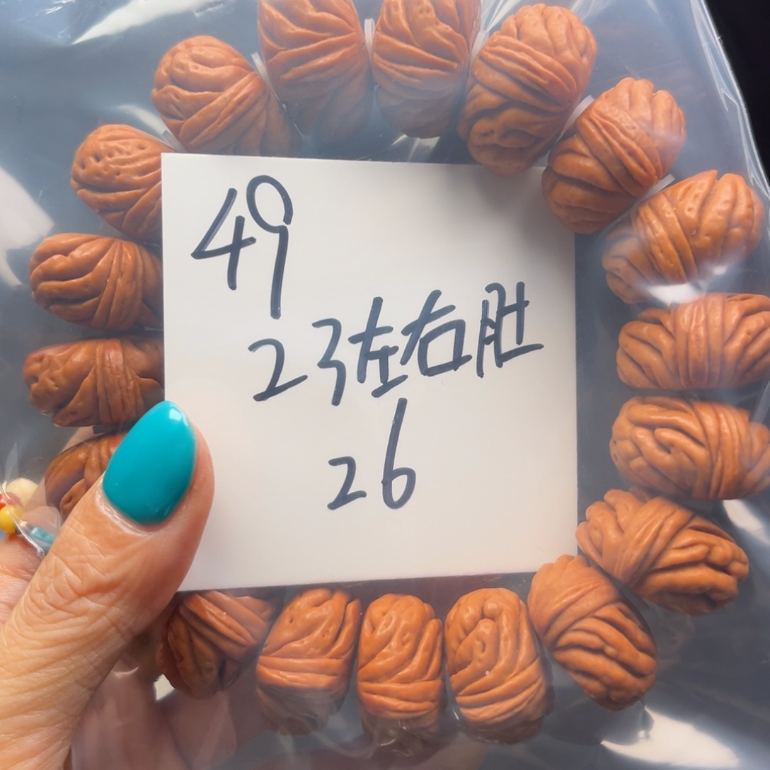 桃核手串睡***?秦岭龙纹桃核
