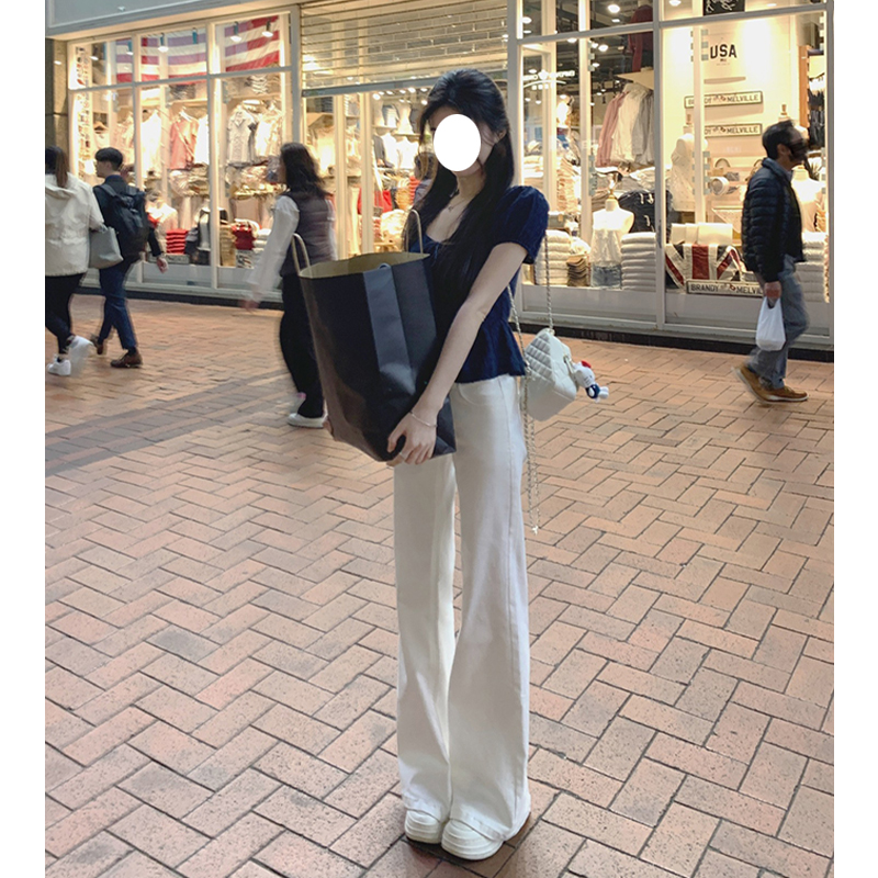 美式白色微喇牛仔裤女秋季2025新款低腰直筒显瘦梧桐阔腿拖地裤子