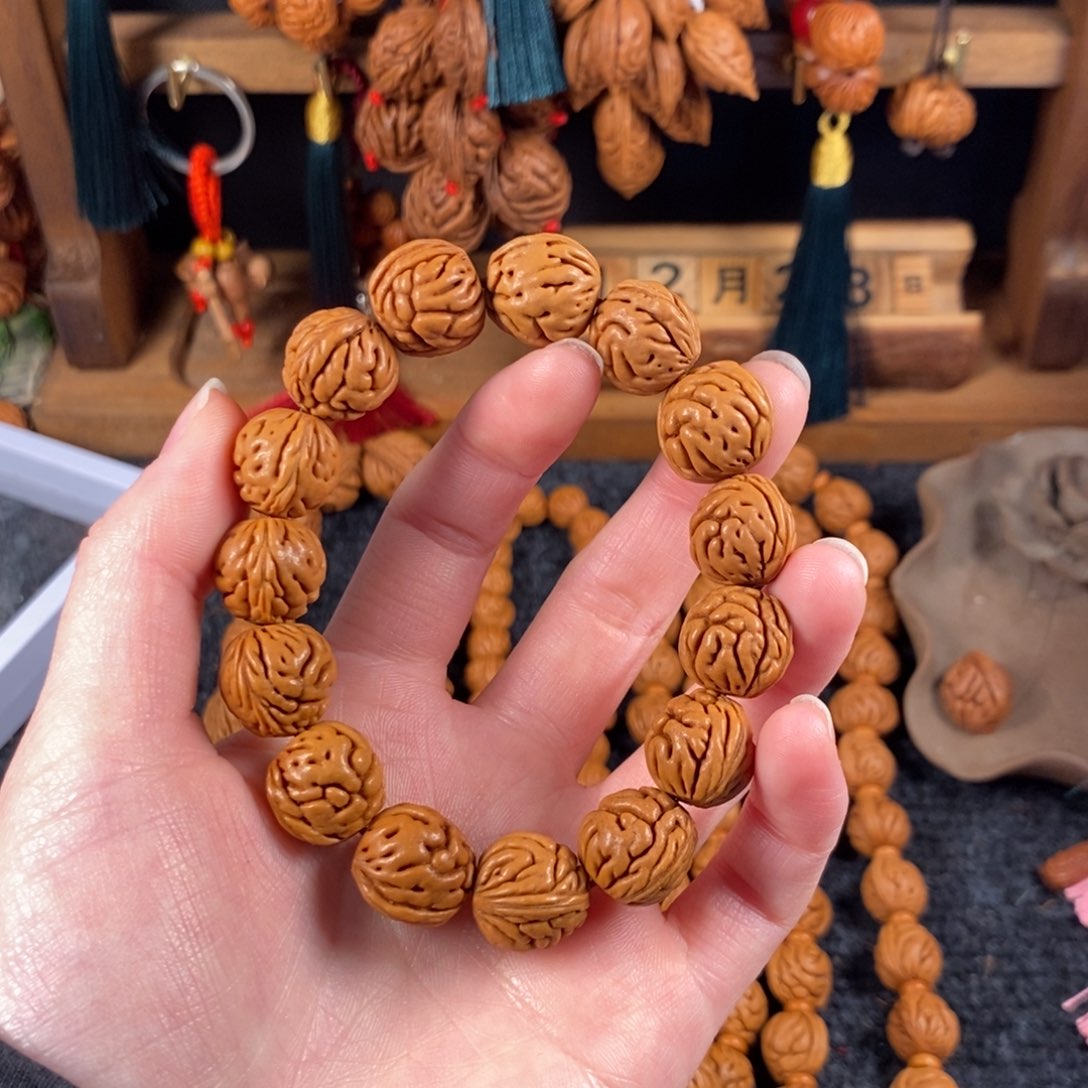 吊坠桃核桃枭手串