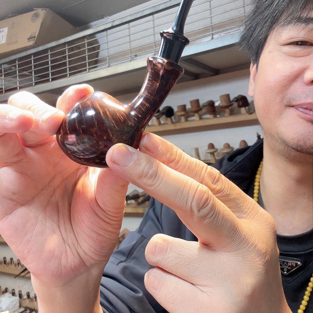 破**章焦耀烟斗一鸡毛