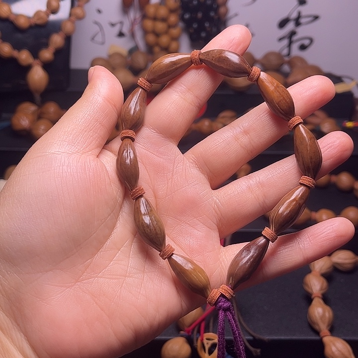 记***活手串橄榄核紫核异形10.24