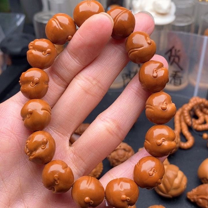 玛***卡橄榄核吊坠百态一条