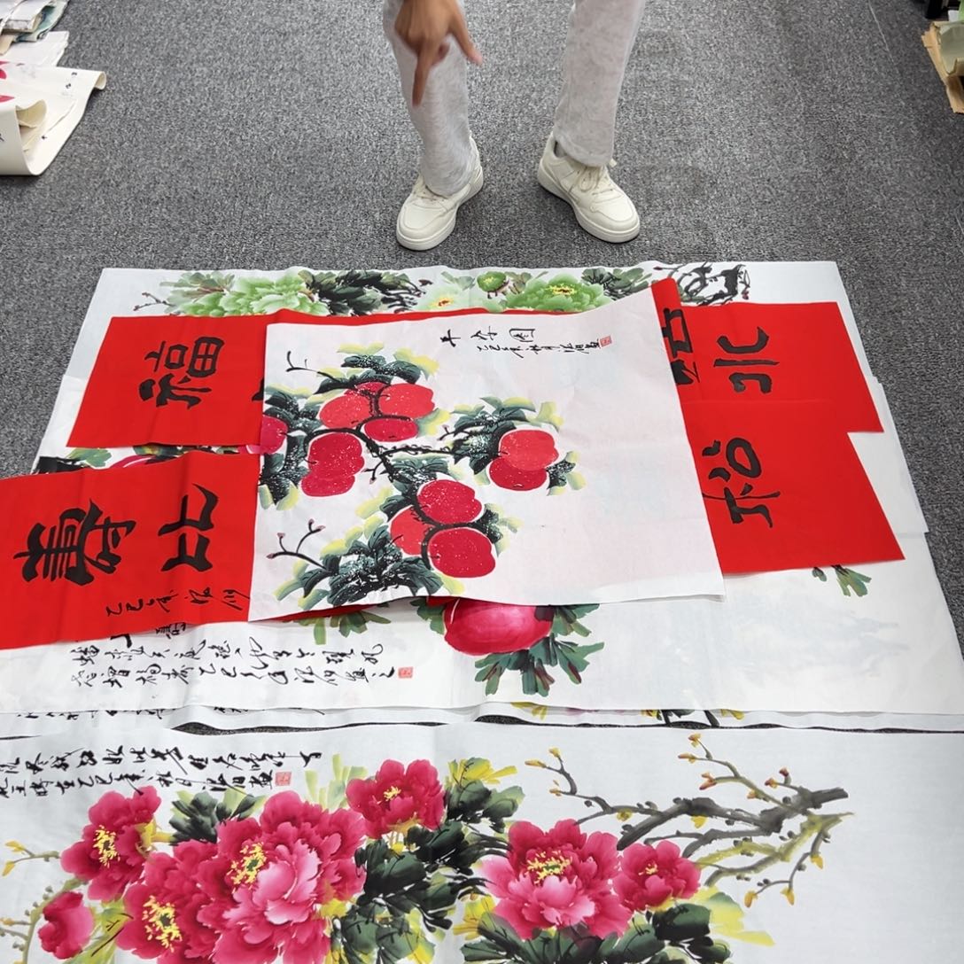 国画卖字画的小男孩