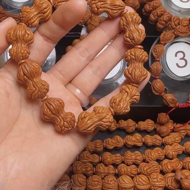 豪***米桃核手串龙纹桃核