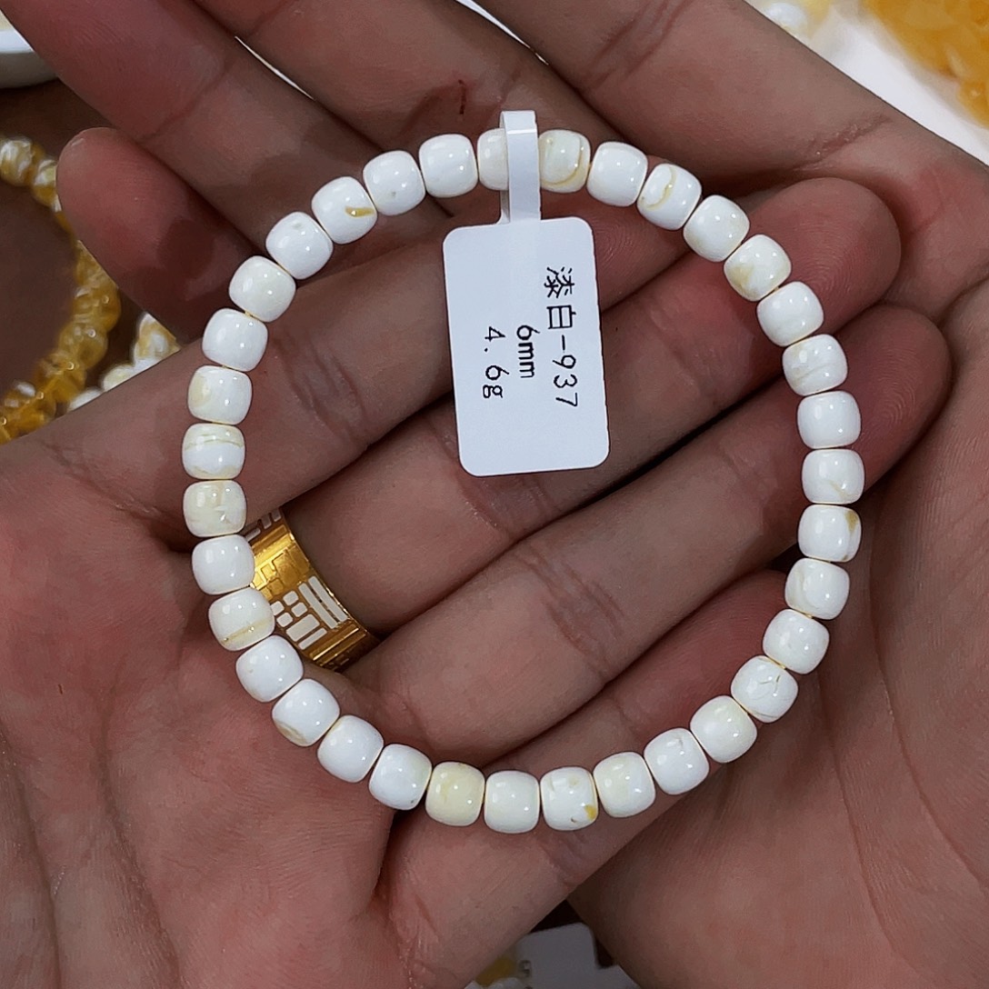 和***.琥珀未镶嵌手链漆白6m