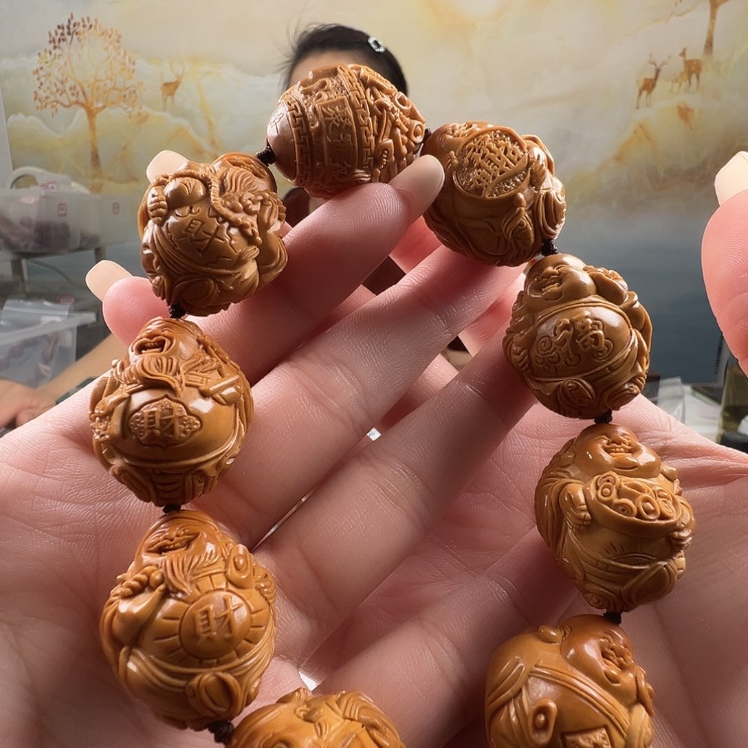 感***妳橄榄核吊坠2.4财迷