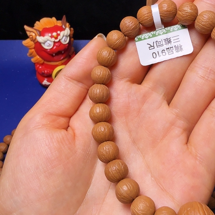 远***朝吊坠猴头核桃凤羽