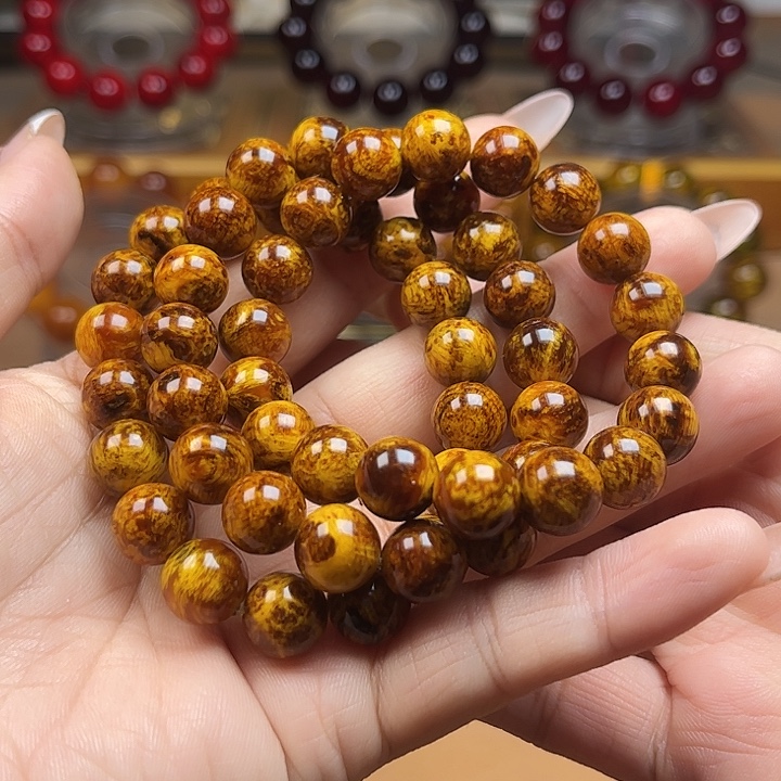 那***孩贝壳杉（血龙木）手串/手链