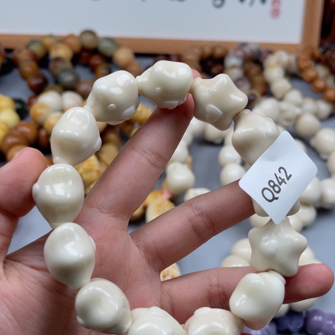 吊坠菩提根/象牙果用****7Q842星星22-24瑕疵一串