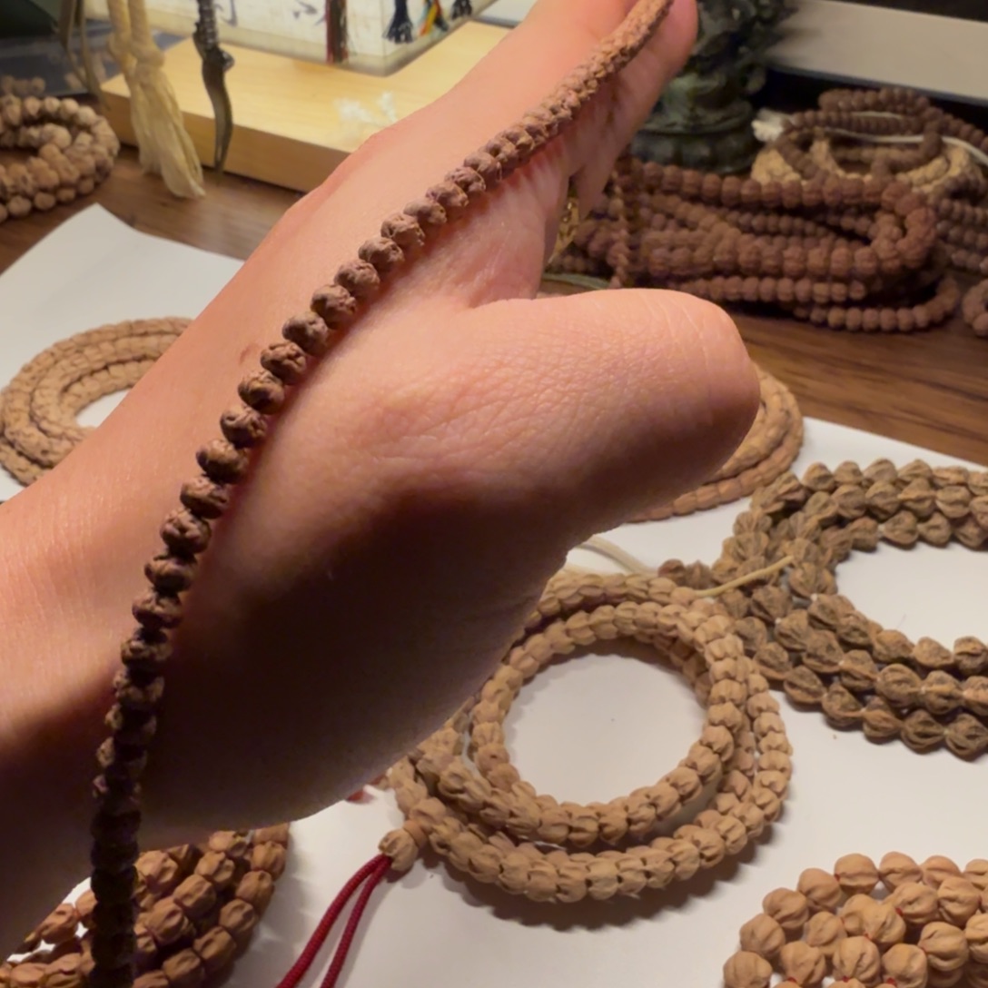 苏***南柏香籽/百香籽吊坠