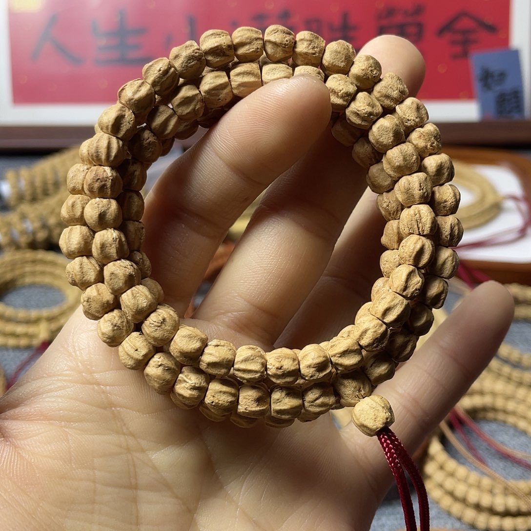 柏香籽/百香籽吊坠红皮微磨莲花龙脊6.5+