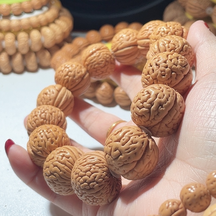 鸿***顺桃核吊坠桃核手串金钱豹44