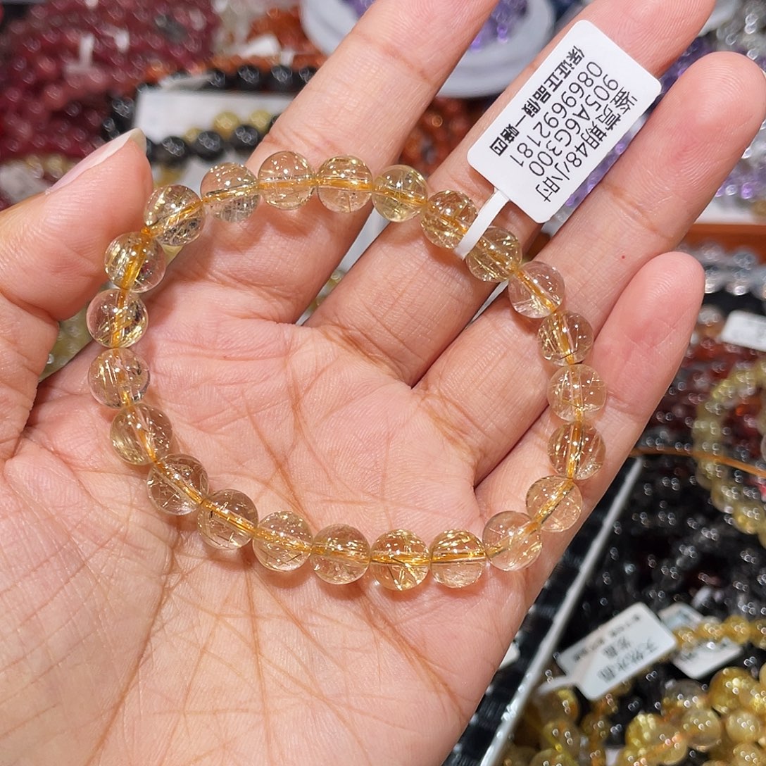 抒***恩未镶嵌水晶手串金发8.2m