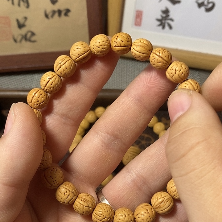 桃核手串顺顺利利108.8。 23