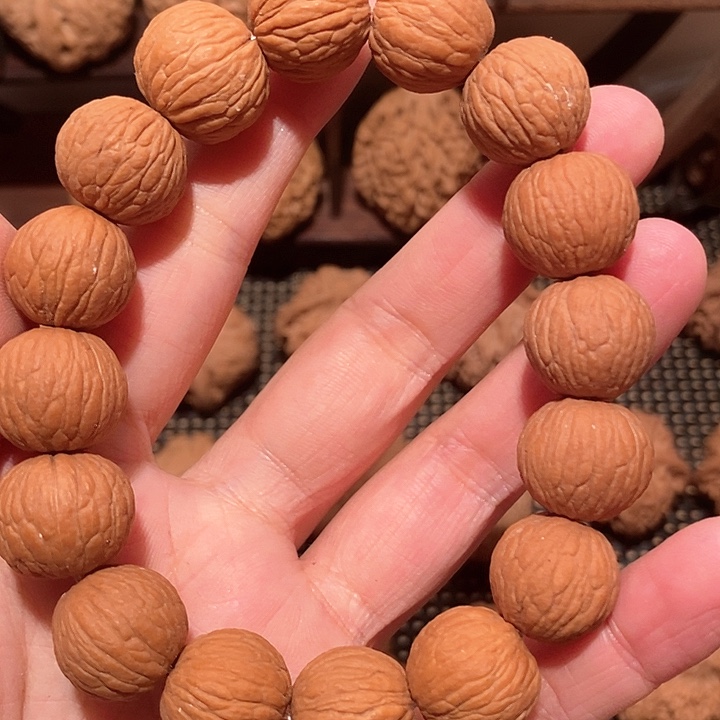 文玩核桃吊坠猴头核桃串