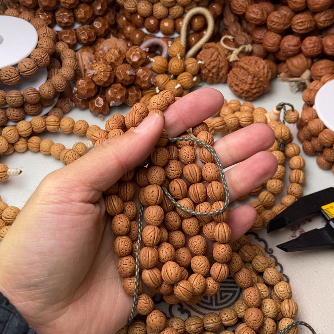 花***汉野生小桃核0.9尺脖挂红皮水滴