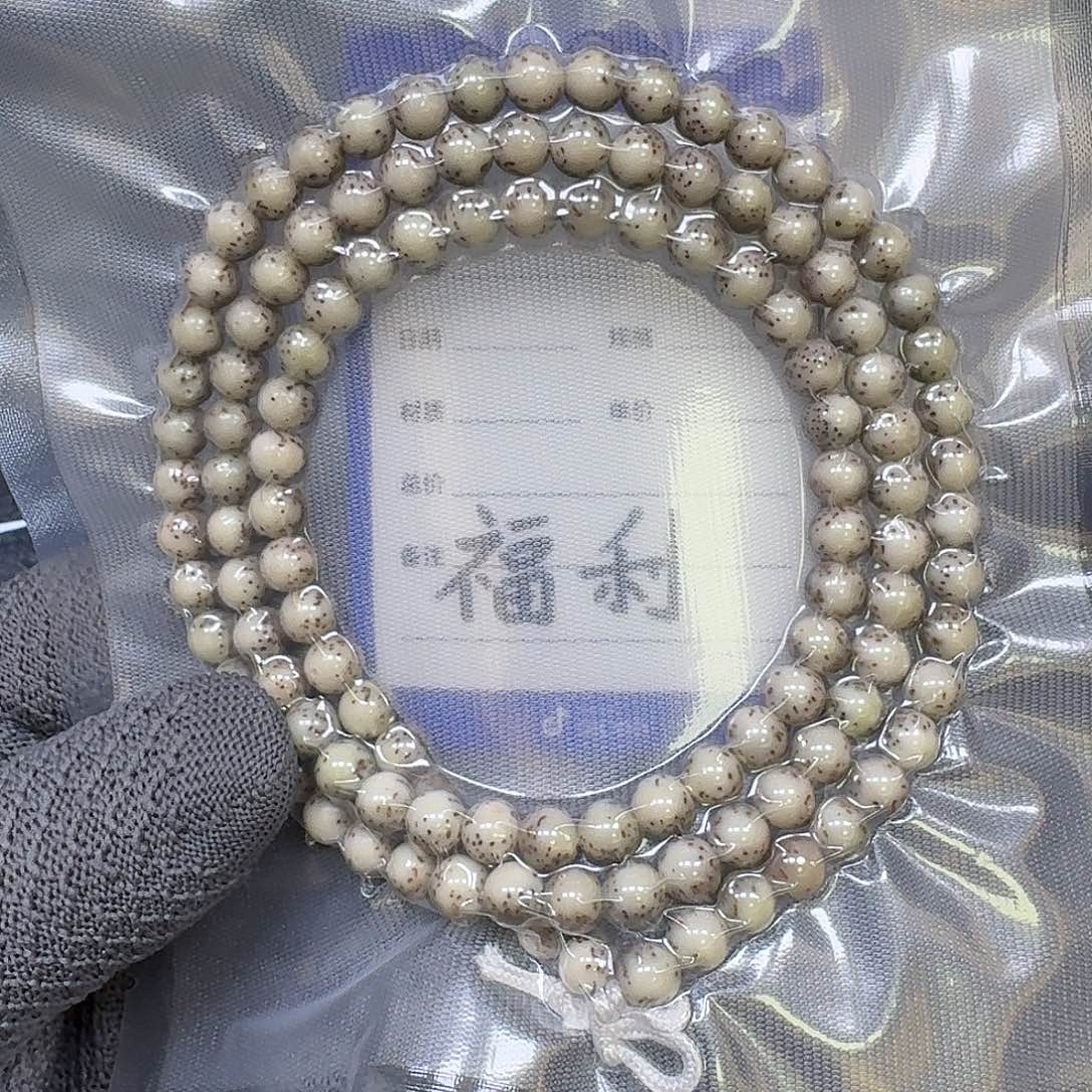 亦***n星月菩提手串7mm石玉料河豚大留白圆珠长串