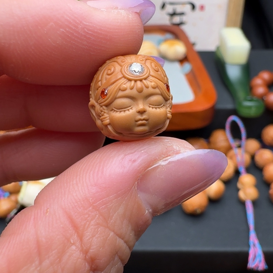 如***卉猴头核桃吊坠镶嵌扎基拉姆