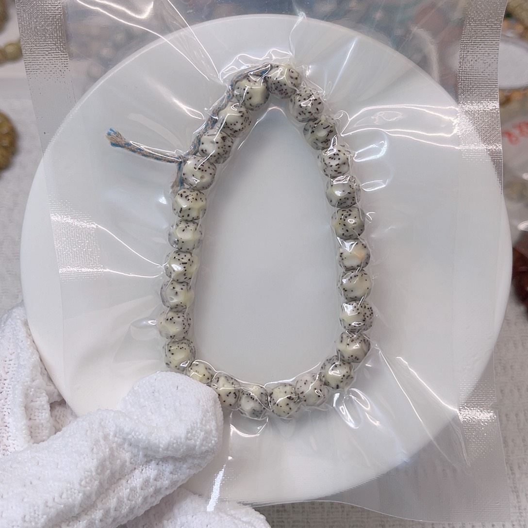 星月菩提手串哈***李8+石玉灰糯冰纯手工无相同枝果海南料