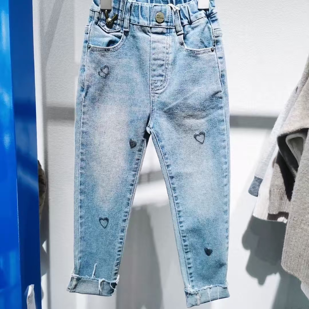 7218童装裤脚毛边牛仔裤