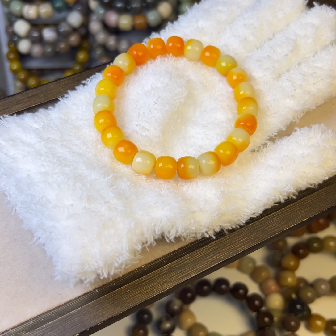 手串菩提根/象牙果橙光桶珠卡10