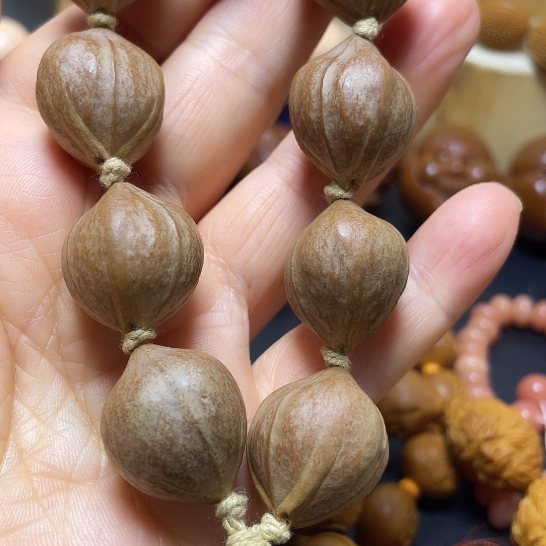 橄榄核手串qerrtt